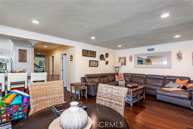 The open floor plan gives the large family room with casual dining area an inviting feel.