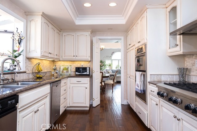 Kitchen  with granite counters and 6 burner stove