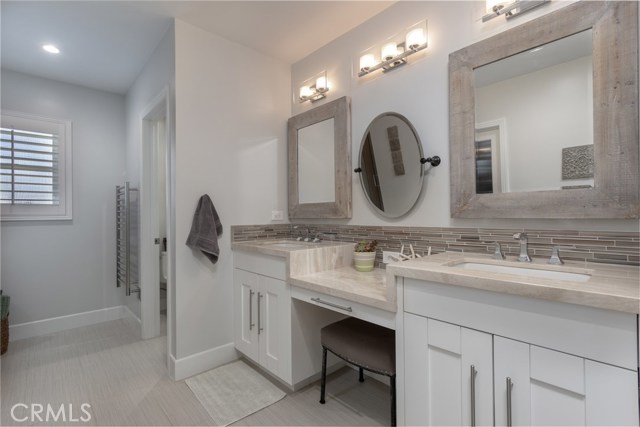 Master bath with private toilet area.