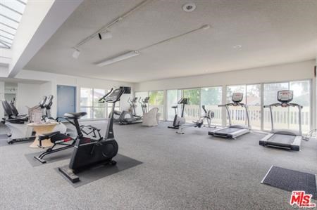 Cardio Room overlooking the pool.