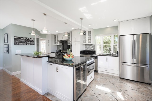 View of kitchen island with breakfast bar