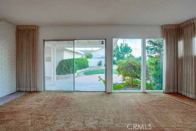 Large Living Room with view of back yard area.