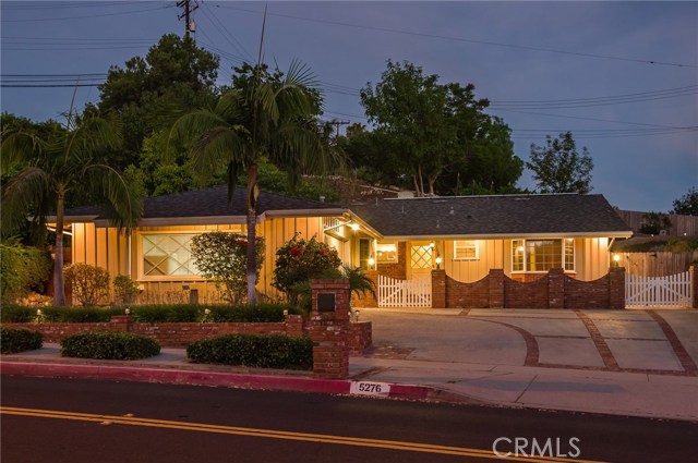 Brilliantly-lit home at night