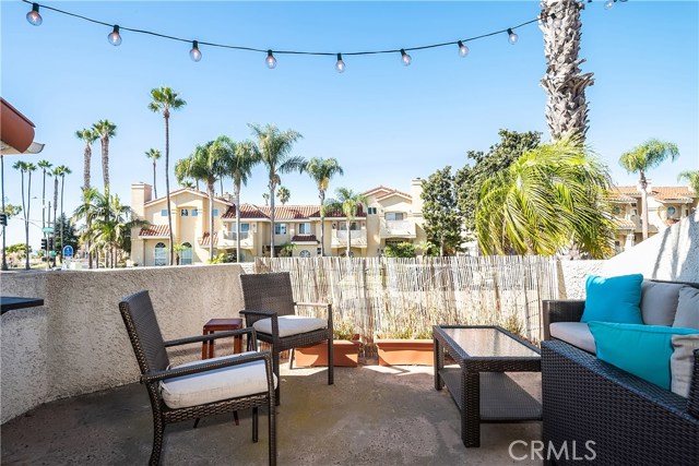 Entertain and enjoy ocean breezes from the large patio off of the maining living area.