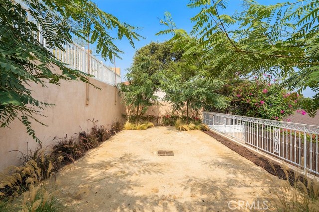 2nd zone in back yard. Plans for a pool in this area were recently made and are available to the future homeowner.