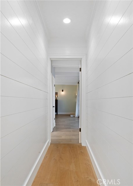 The detail in the hallway's shiplap finish is a traditional detail with contemporary appeal.