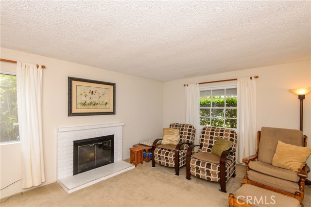 This wood burning fireplace graces the living room!