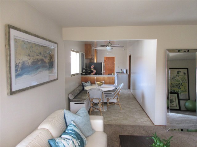 View from living room to dining area and kitchen