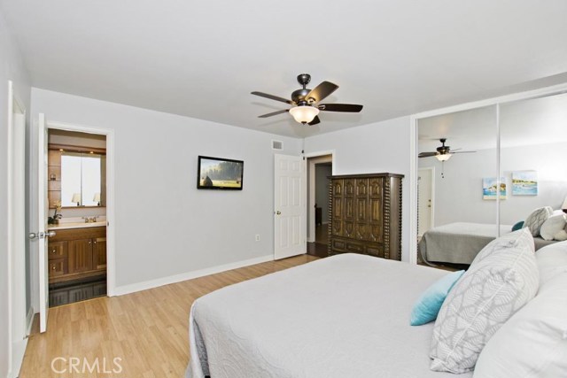 Master Bedroom with wood laminate flooring