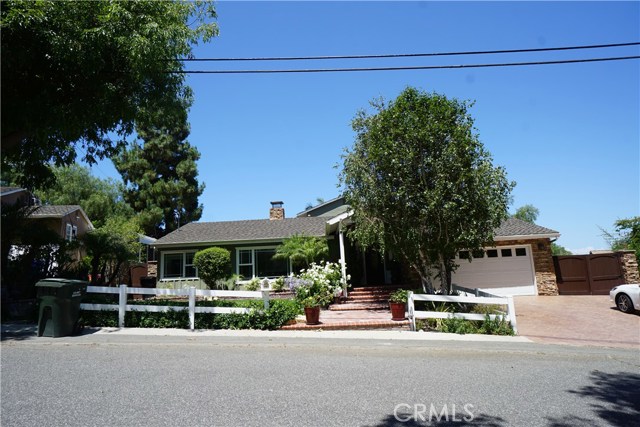 Red Brick Drive way and 2 car garage, direct entry to home.