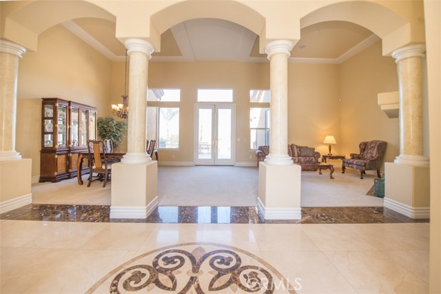 Through the Entry toward Formal Living Room and Dining Room