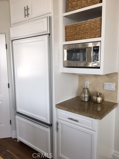 Custom paneled Kitchen Aid refrigerator...