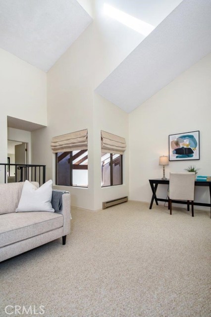 Upper Level Family Room with High Vaulted Ceilings