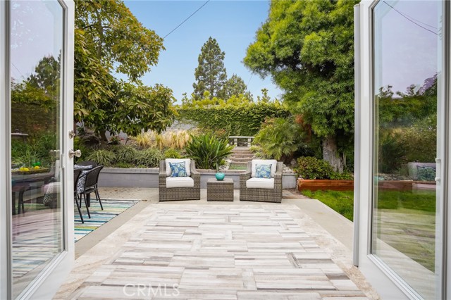 View from the living room and breakfast nook out onto the backyard.