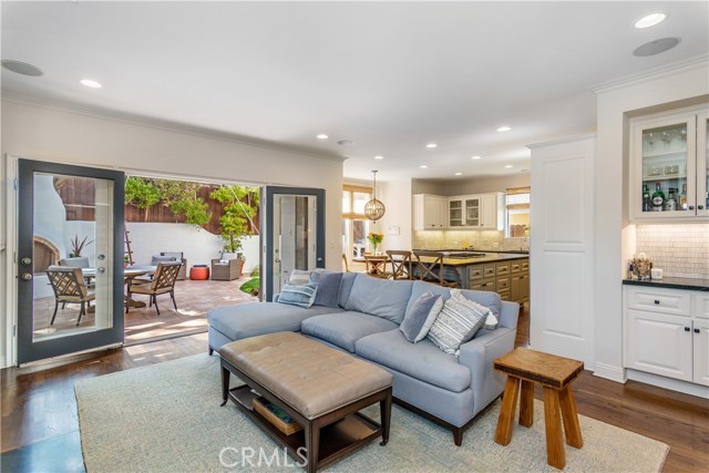 Family room is open to kitchen, back patio and grassy yard