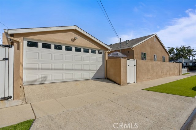 Two- Car Garage connected to Guest Suite.