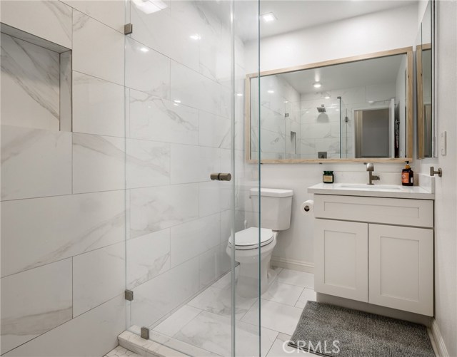 Remodeled hall bath with large shower