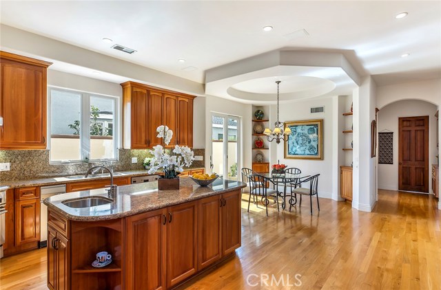 Bright and open chef's kitchen with breakfast area and plenty of storage.
