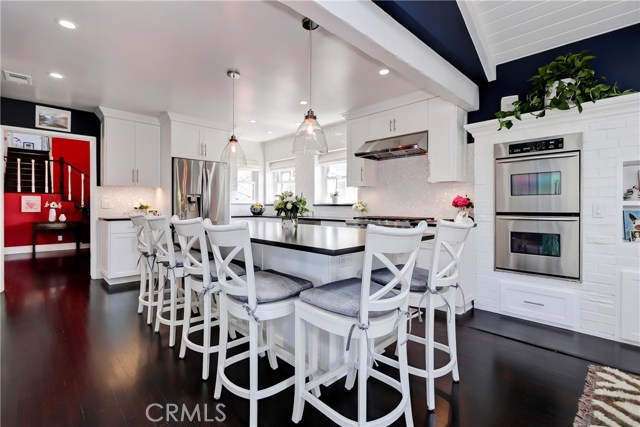 Room for a crowd - friends and family can gather in this remodeled chef's kitchen.