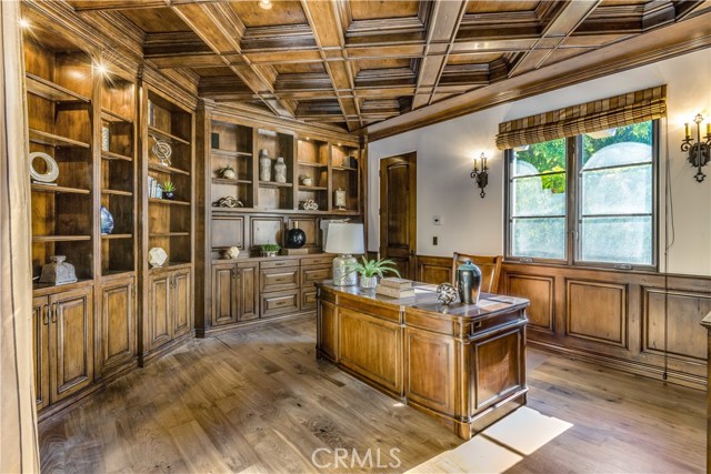 Home office with laden in custom cabinetry