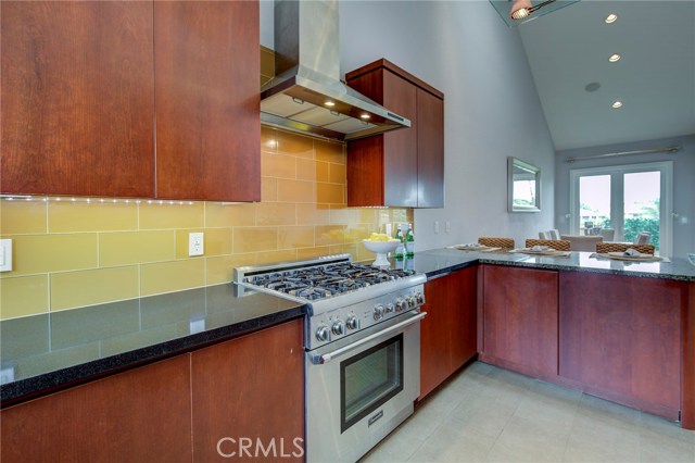 kitchen with Thermador appliances and built-in fridge