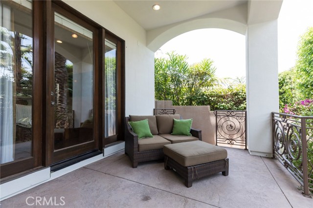 Cover back patio over looks putting green ansh lush back yard