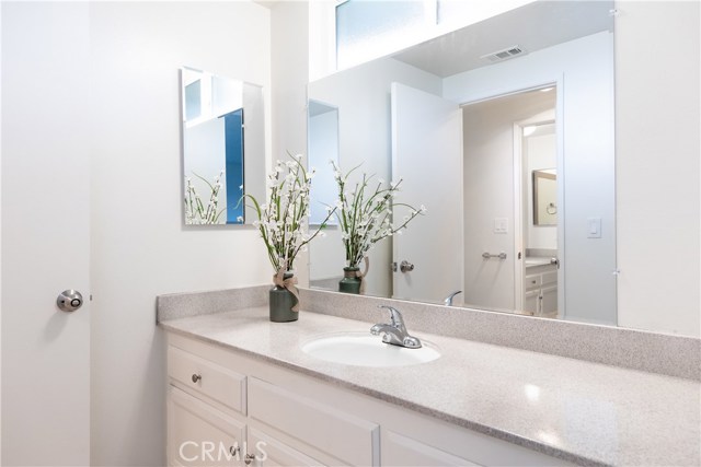 This sink and vanity area has direct access from the master bedroom