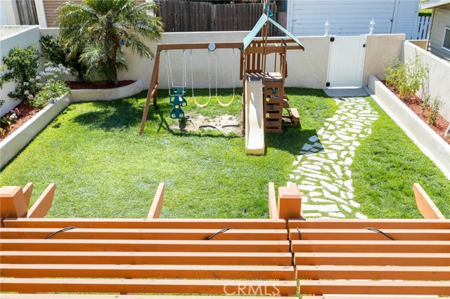 View of the backyard from upstairs balcony. View of the backyard from upstairs balcony.