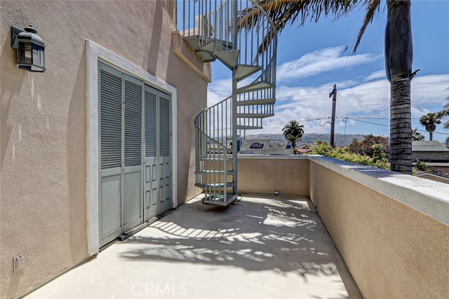 Family Room Deck with staircase to roof deck