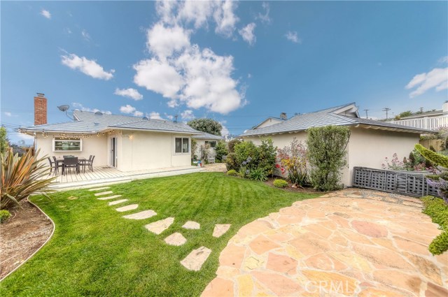 Backyard with patios and deck