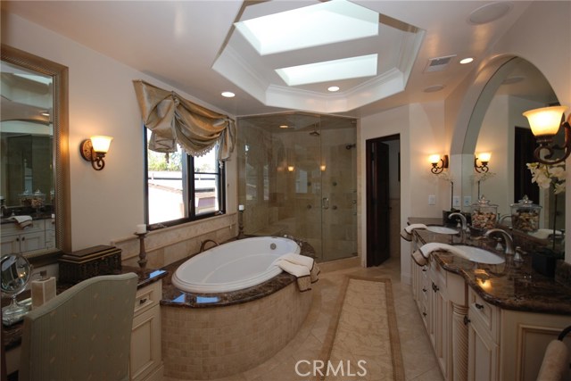 Master bath with steam shower, separate vanity desk