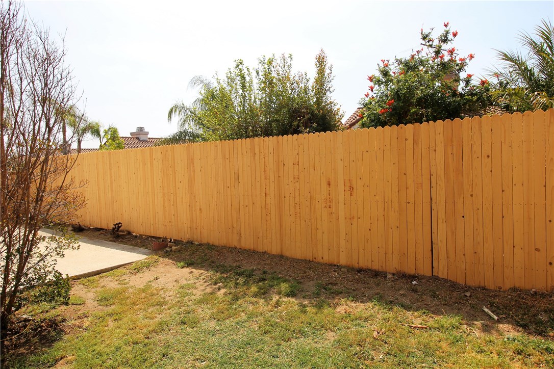 New wood fence at rear