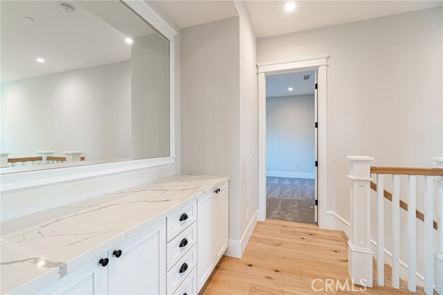 Upstairs hallway built-in storage cabinet.