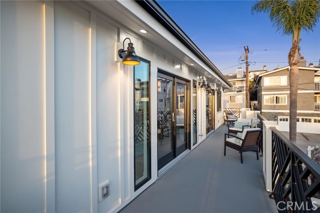 Expansive corridor balconies true to the beach city vibe