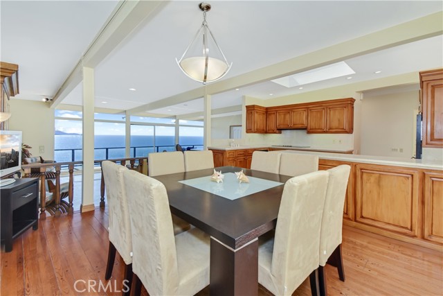 Dining room with views of ocean/Catalina and kitchen.