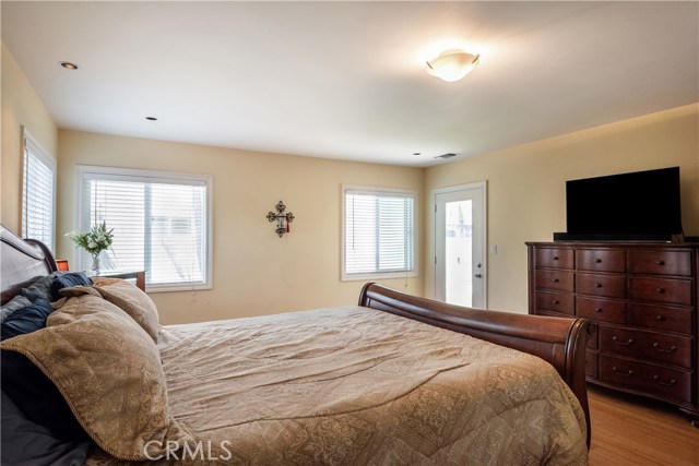 Master Bedroom with Door to Backyard & Patio