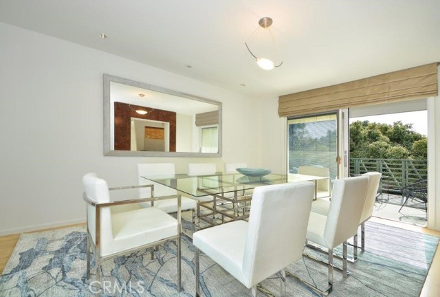 Formal Dining Room Opens to an Ocean View Deck