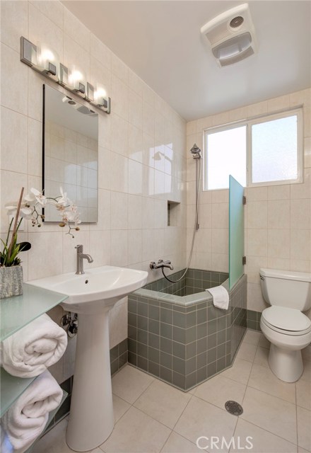 Swedish soaking tub.  Bathroom is a wet bath.