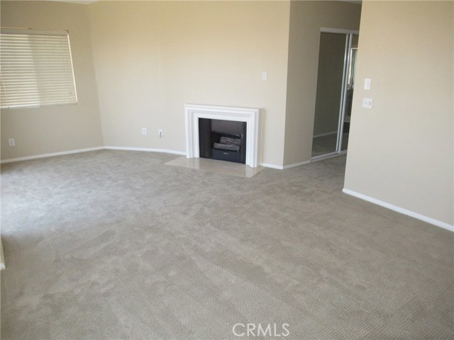 Master Suite with Fireplace and sitting area and includes a panoramic ocean view and his and her closets.