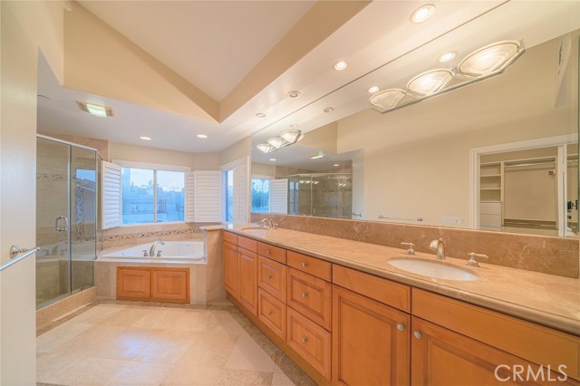 Primary Bath with separate shower and soaking tub