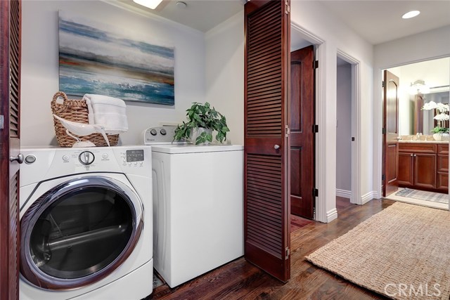 Separate laundry area, located on the same floors as all 3 bedrooms, includes louvered doors.