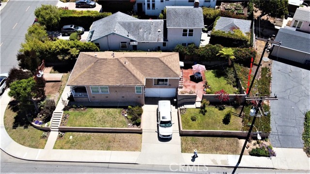 Red dotted line shows the back property line. The back wall is not on the boundary. There is additional yard space behind the wall. This is a VERY BUILDABLE lot (check with City of RB)!