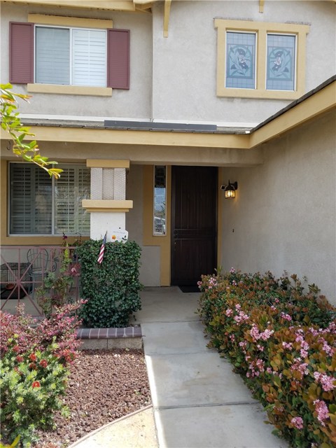 Beautiful Landscaping Welcomes You As You Approach The Front Porch And Door.