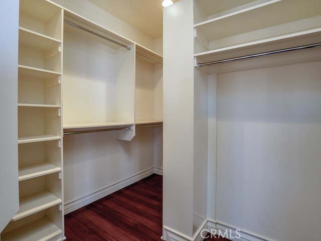 Large, well-organized walk-in closet in master bedroom!  Gorgeous hardwood floors here as well!