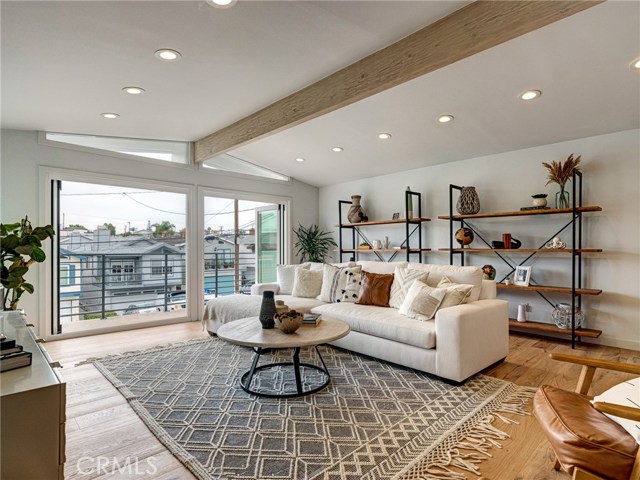 Completely and stunningly remodeled in 2019.  Wood beamed ceilings, Vittoria French oak flooring throughout, expansive sliding doors, recessed lighting.
