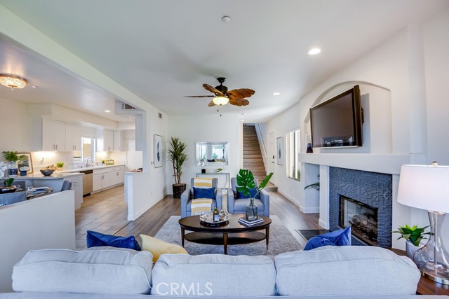 Downstairs are the living space, dining area, kitchen with breakfast bar and powder room.