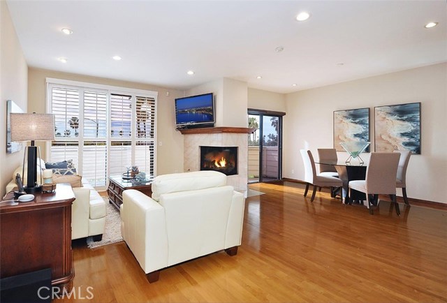 Living Room and Dining Room Open to Upper Deck