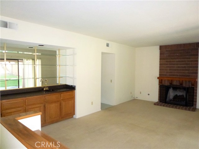 Family Room with wet bar and fireplace