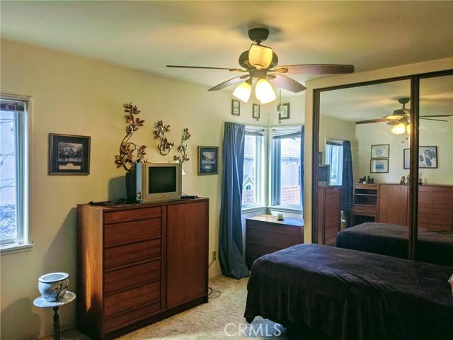 southeast bedroom has lots of light and has dual paned vinyl windows.