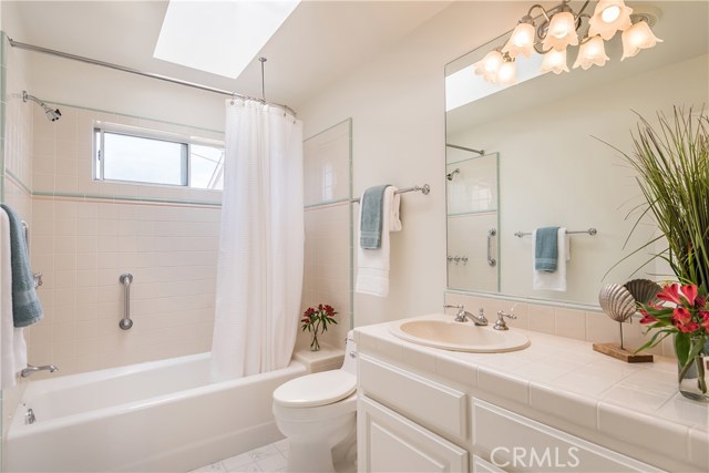 The private full bathroom with skylight